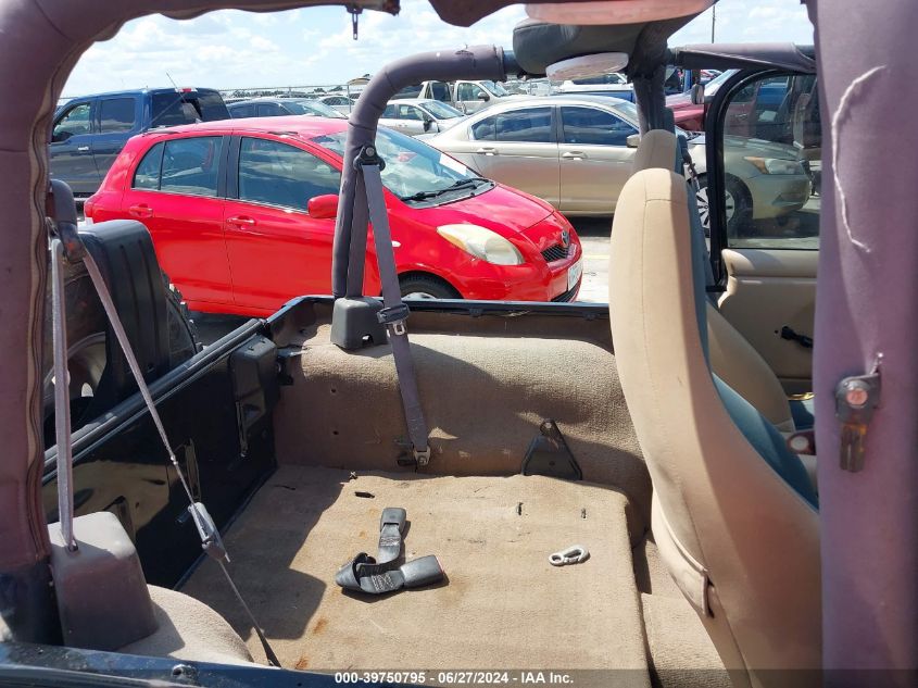 2002 Jeep Wrangler Sport VIN: 1J4FA49S62P771280 Lot: 39750795