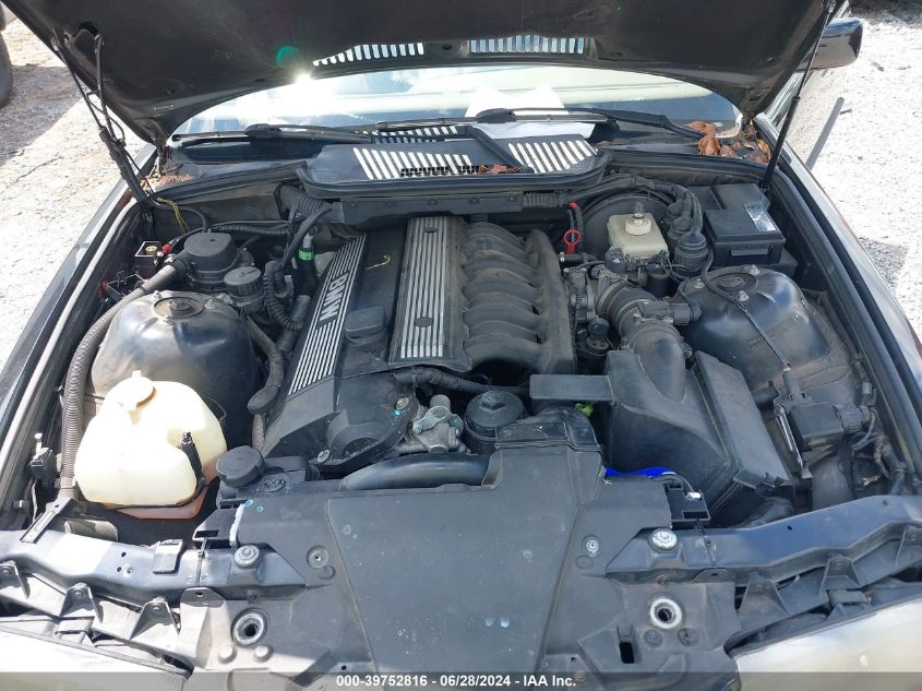 1999 BMW 323Ic VIN: WBABJ8336XEM26411 Lot: 39752816