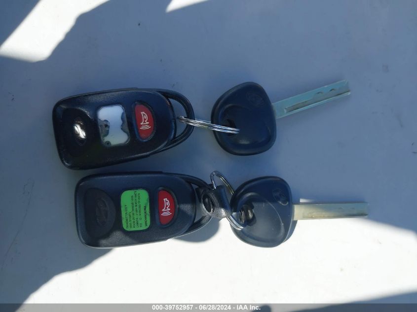 2012 Hyundai Veloster Base W/Gray VIN: KMHTC6AD7CUO72847 Lot: 39752957