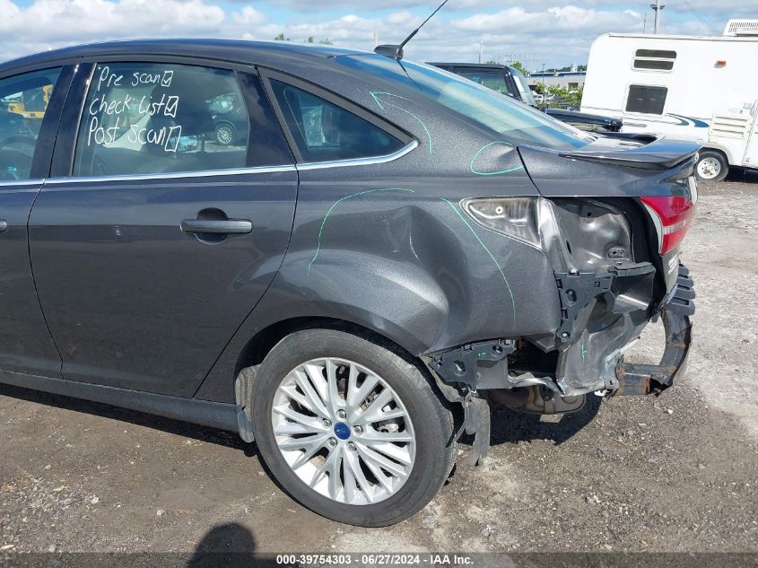 2016 Ford Focus Titanium VIN: 1FADP3J2XGL313263 Lot: 39754303
