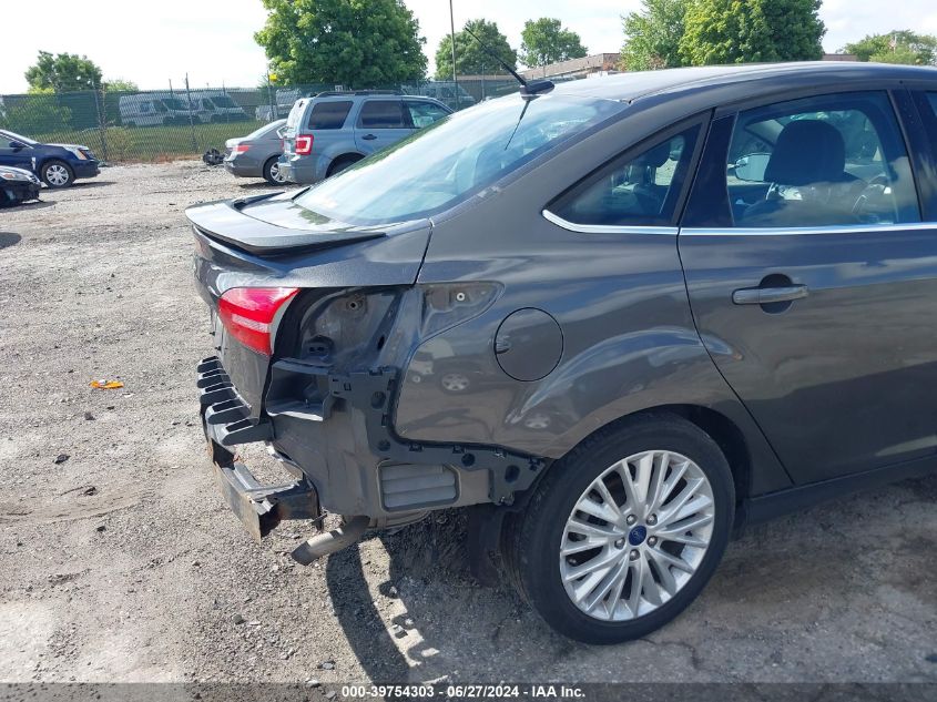 2016 Ford Focus Titanium VIN: 1FADP3J2XGL313263 Lot: 39754303