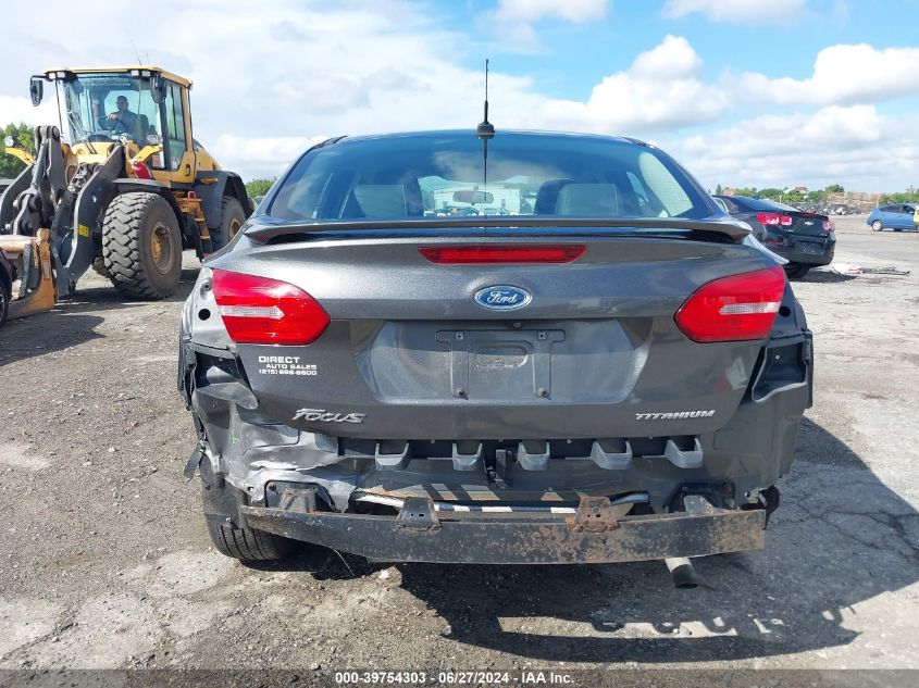 2016 Ford Focus Titanium VIN: 1FADP3J2XGL313263 Lot: 39754303
