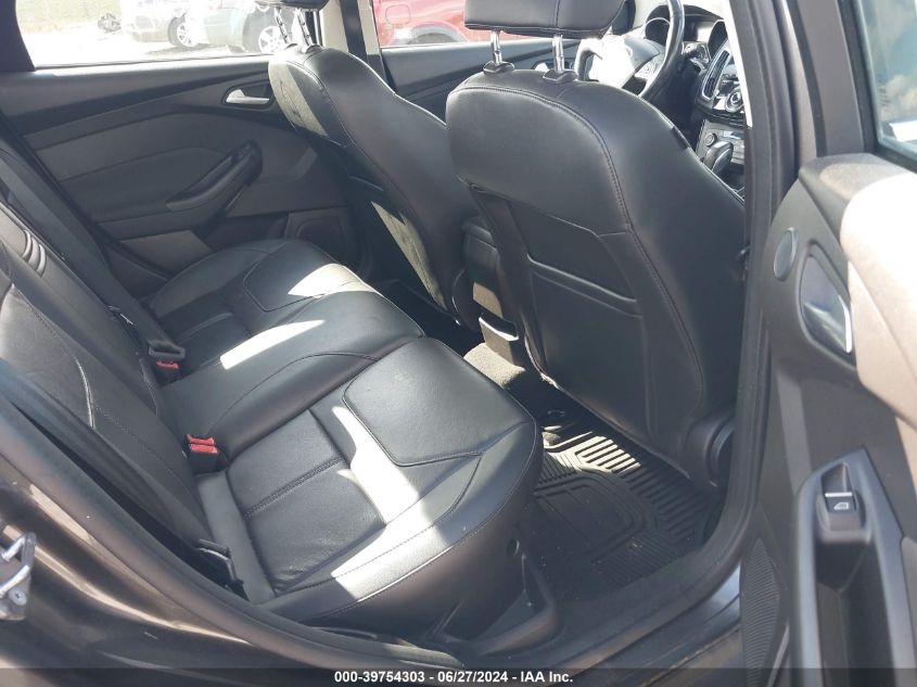 2016 Ford Focus Titanium VIN: 1FADP3J2XGL313263 Lot: 39754303