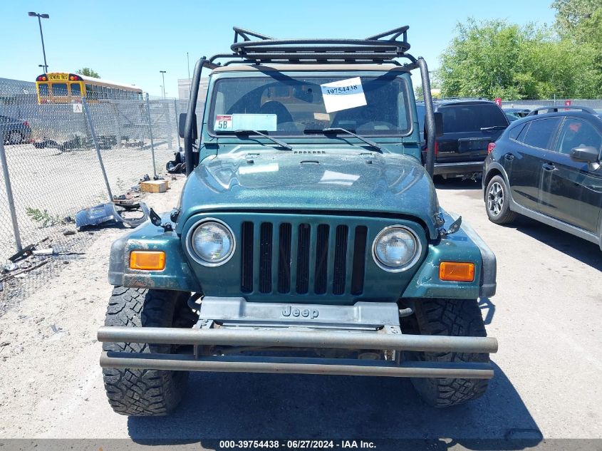 2000 Jeep Wrangler Sport VIN: 1J4FA49S2YP792832 Lot: 39754438