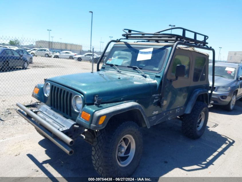 2000 Jeep Wrangler Sport VIN: 1J4FA49S2YP792832 Lot: 39754438