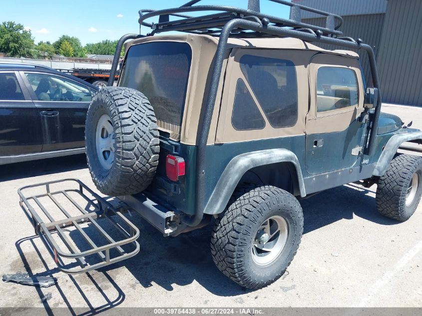 2000 Jeep Wrangler Sport VIN: 1J4FA49S2YP792832 Lot: 39754438