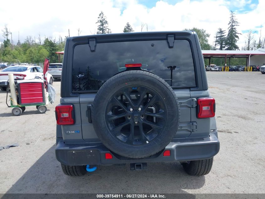 2023 Jeep Wrangler 4Xe Sahara VIN: 1C4JJXP64PW696213 Lot: 39754911