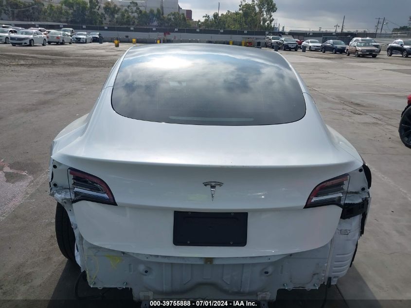 2021 Tesla Model 3 Standard Range Plus Rear-Wheel Drive VIN: 5YJ3E1EA4MF065771 Lot: 39755888