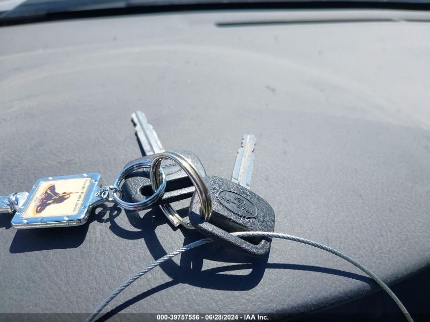 2003 Toyota Corolla Ce/Le/S VIN: 1NXBR32E63Z001039 Lot: 39757556