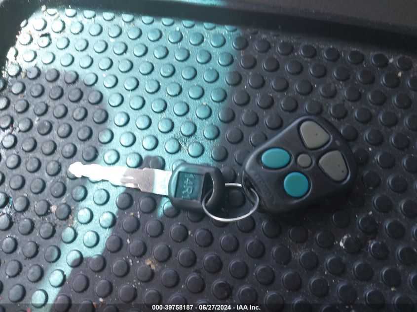 2003 Chevrolet Tahoe Lt VIN: 1GNEK13Z33J143515 Lot: 39758187