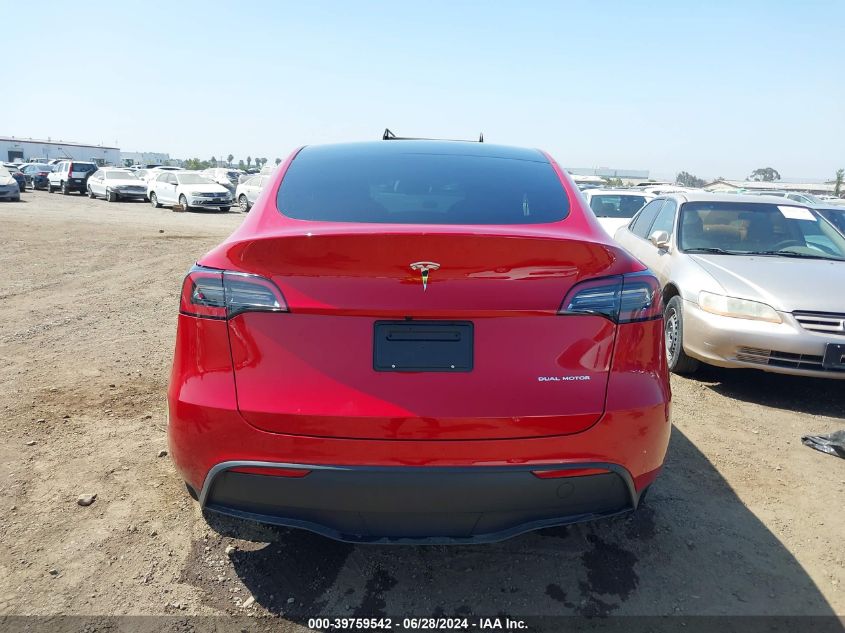 2023 Tesla Model Y Awd/Long Range Dual Motor All-Wheel Drive VIN: 7SAYGDEE4PA028731 Lot: 39759542