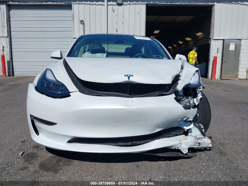 2023 Tesla Model 3 Long Range Dual Motor All-Wheel Drive VIN: 5YJ3E1EB4PF704678 Lot: 39759859