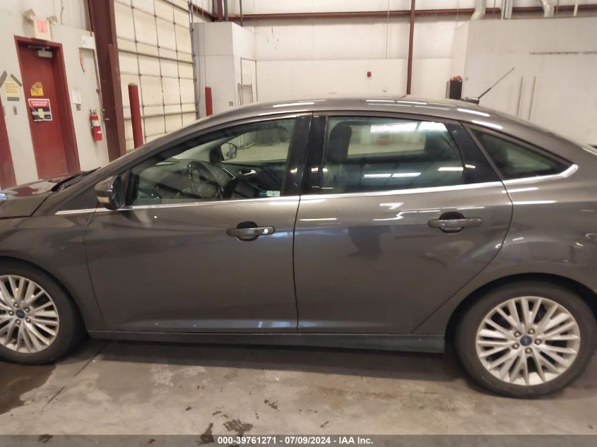 2015 Ford Focus Titanium VIN: 1FADP3J25FL277965 Lot: 39761271