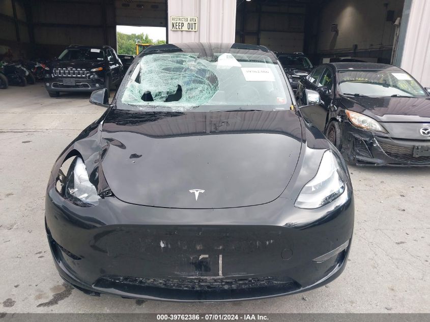 2023 Tesla Model Y Awd/Long Range Dual Motor All-Wheel Drive VIN: 7SAYGDEE0PA186855 Lot: 39762386