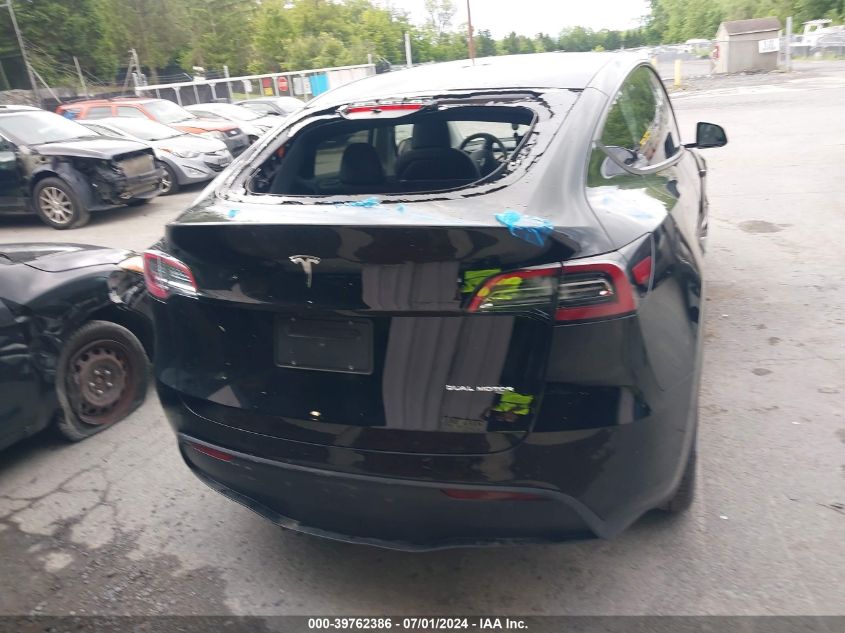 2023 Tesla Model Y Awd/Long Range Dual Motor All-Wheel Drive VIN: 7SAYGDEE0PA186855 Lot: 39762386