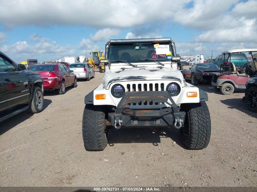 2002 Jeep Wrangler Sahara VIN: 1J4FA59S92P720412 Lot: 39762731