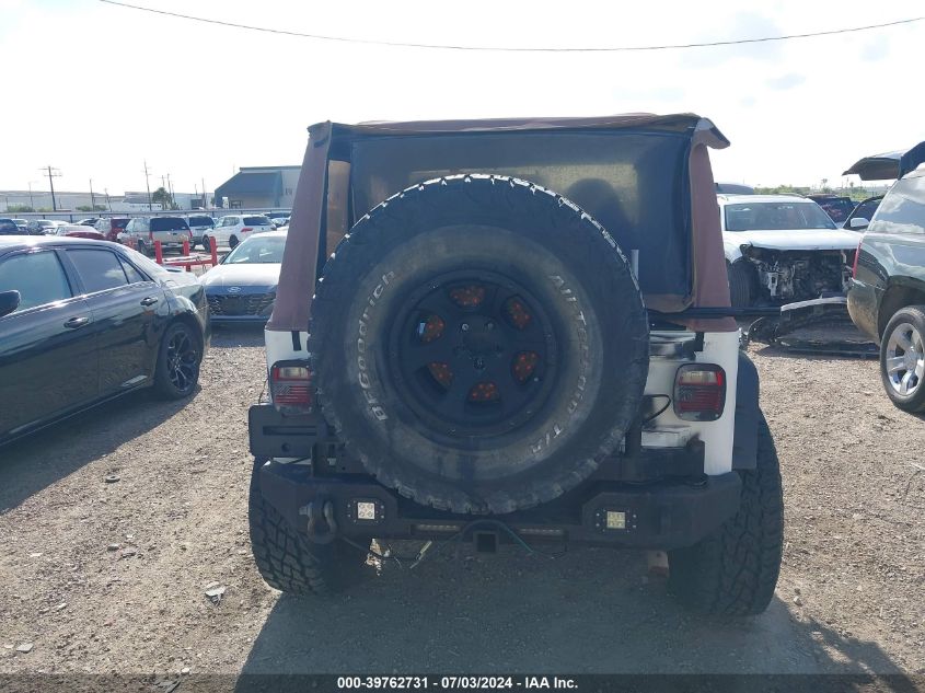 2002 Jeep Wrangler Sahara VIN: 1J4FA59S92P720412 Lot: 39762731