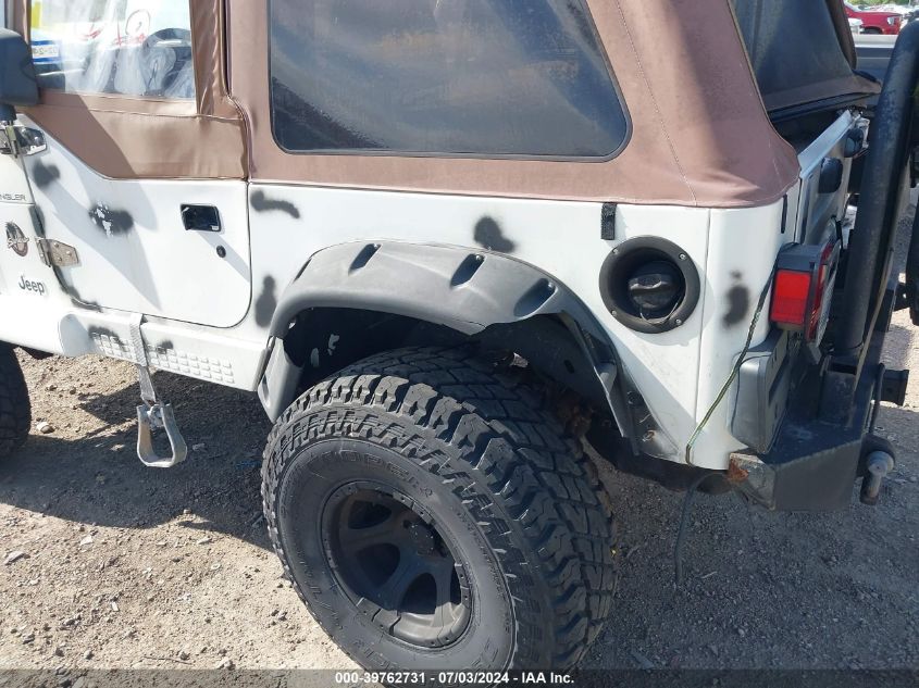 2002 Jeep Wrangler Sahara VIN: 1J4FA59S92P720412 Lot: 39762731