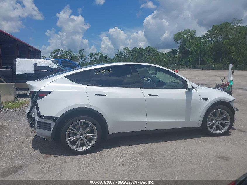 2023 Tesla Model Y Awd/Long Range Dual Motor All-Wheel Drive VIN: 7SAYGDEE4PA153101 Lot: 39763002