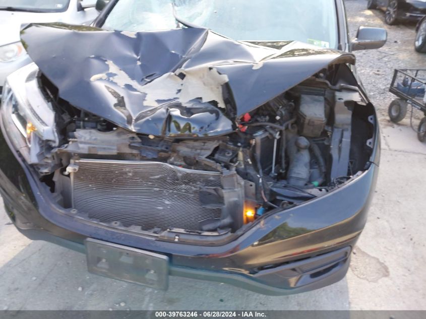 2015 Honda Cr-V Lx VIN: 2HKRM3H38FH543104 Lot: 39763246