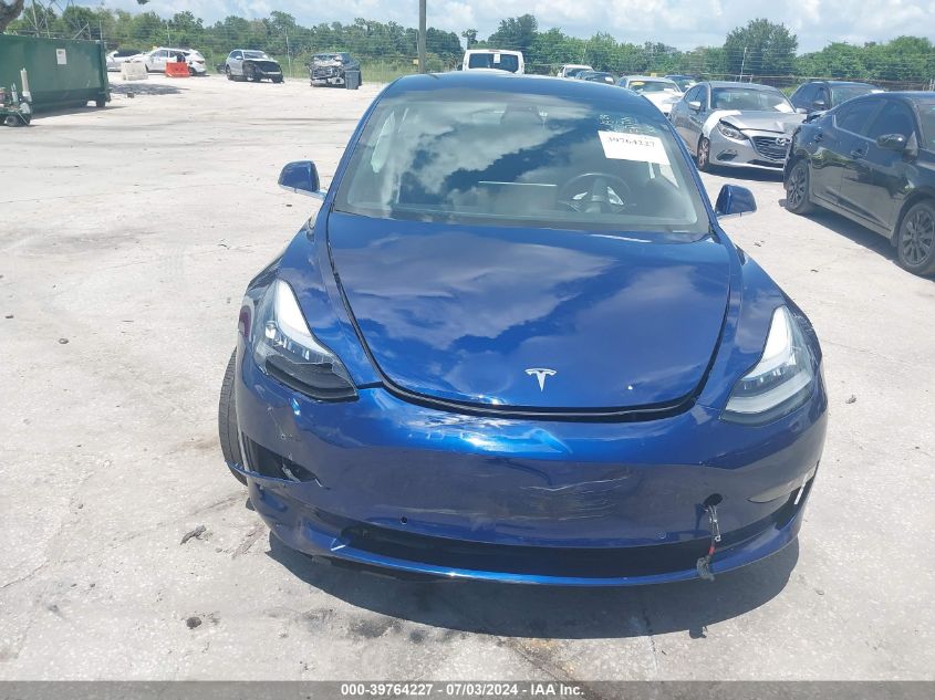 2018 Tesla Model 3 Long Range/Mid Range VIN: 5YJ3E1EA4JF027713 Lot: 39764227