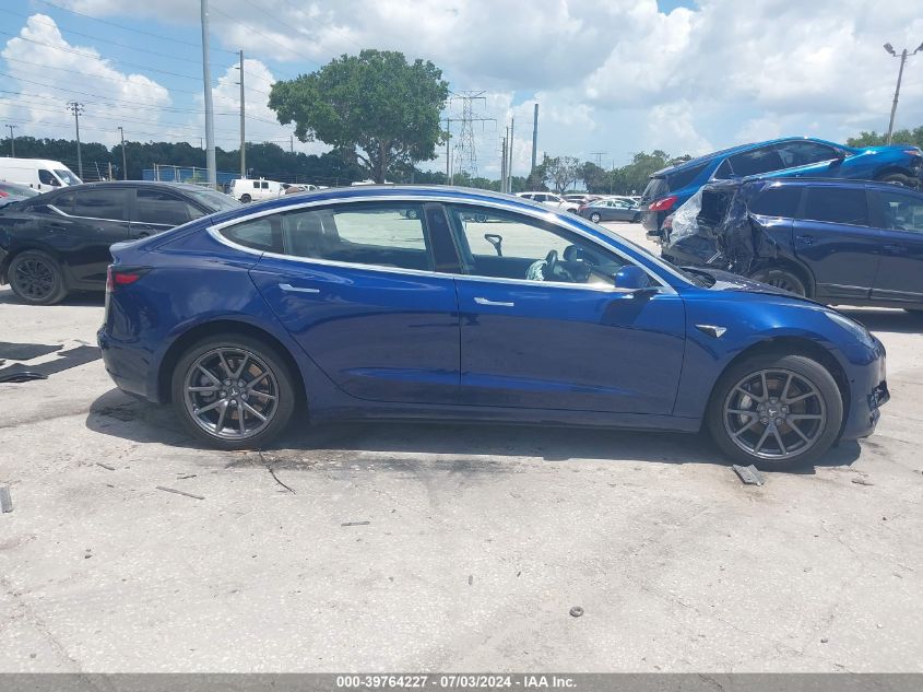 2018 Tesla Model 3 Long Range/Mid Range VIN: 5YJ3E1EA4JF027713 Lot: 39764227