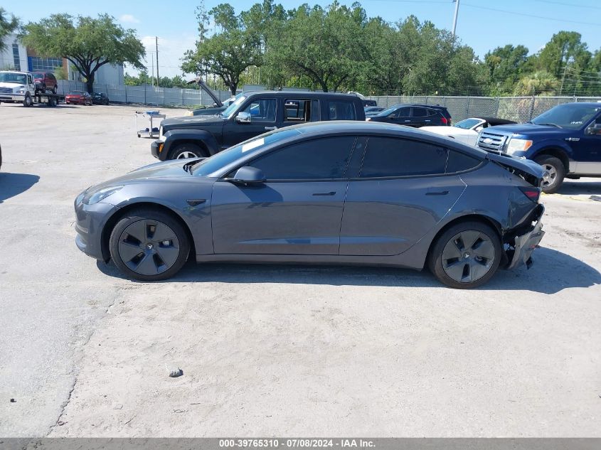 2022 Tesla Model 3 VIN: 5YJ3E1EBXNF257349 Lot: 39765310