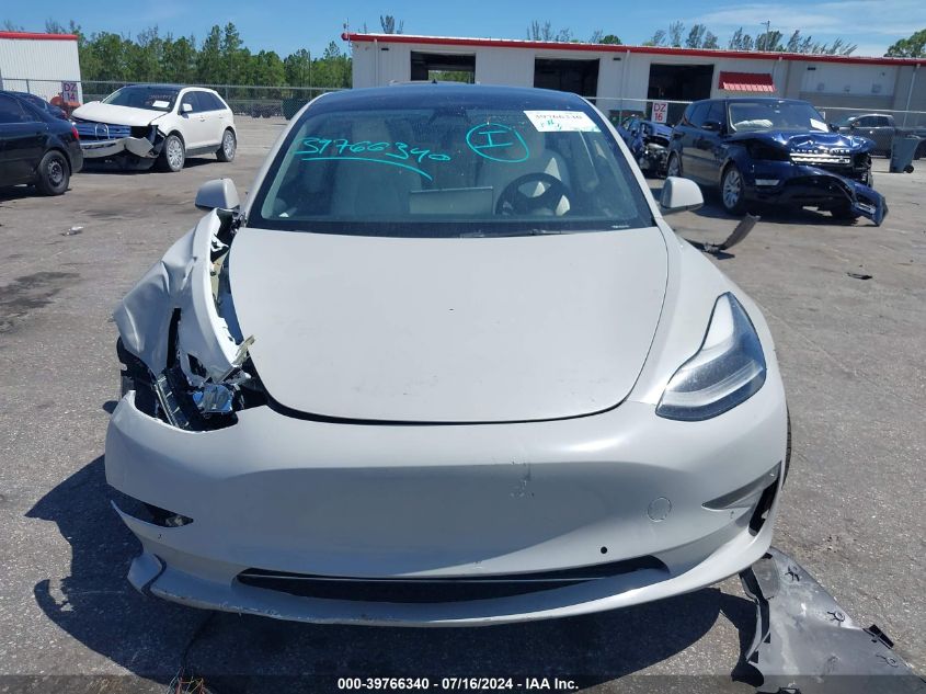 2022 Tesla Model 3 Performance Dual Motor All-Wheel Drive VIN: 5YJ3E1EC6NF361619 Lot: 39766340