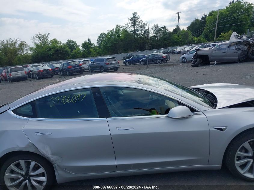 2018 Tesla Model 3 VIN: 5YJ3E1EAXJF003500 Lot: 39766697