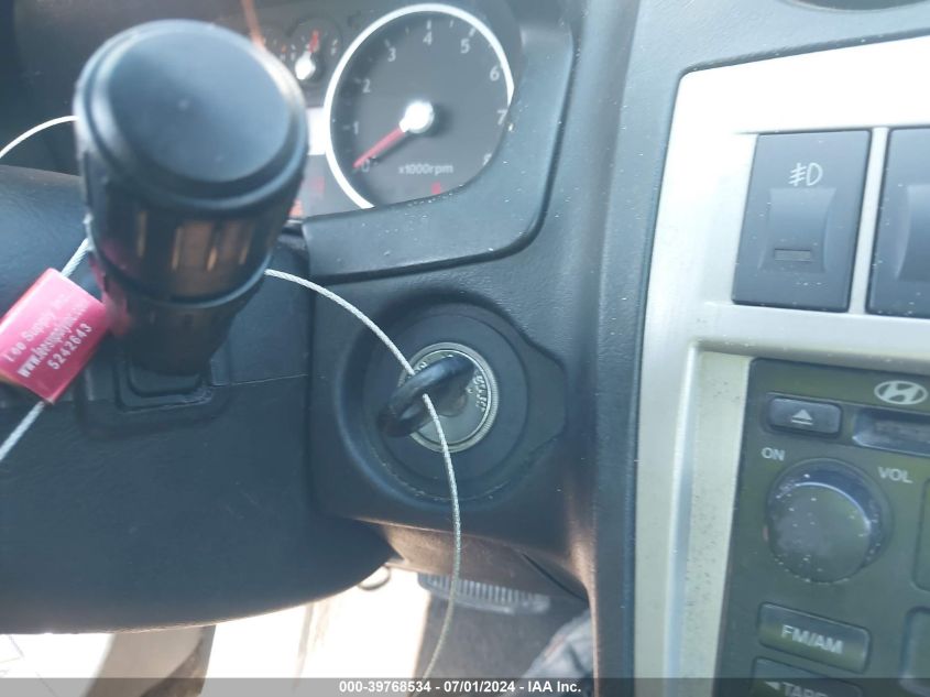 2005 Hyundai Tiburon Gt/Se VIN: KMHHN65F95U169000 Lot: 39768534