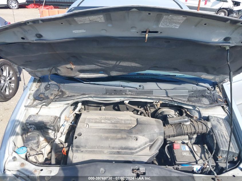 2002 Honda Odyssey Lx VIN: 2HKRL18542H547279 Lot: 39768730