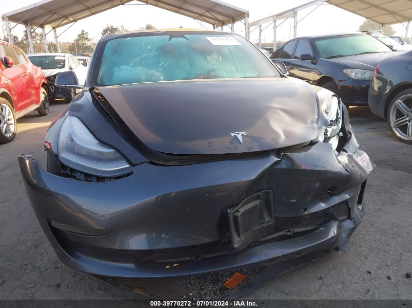 2018 Tesla Model 3 Long Range/Mid Range VIN: 5YJ3E1EA1JF056893 Lot: 39770272