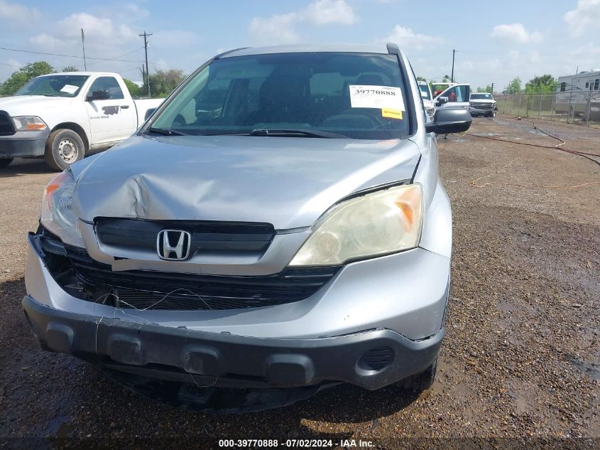 2009 Honda Cr-V Lx VIN: 3CZRE38389G700604 Lot: 39770888