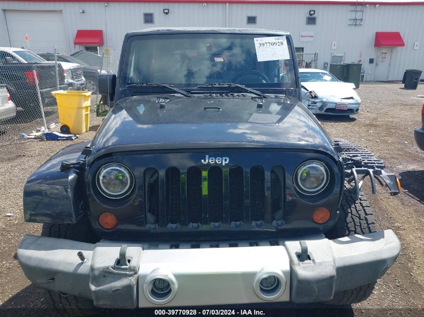 2008 Jeep Wrangler Unlimited Sahara VIN: 1J8GA59168L542906 Lot: 39770928