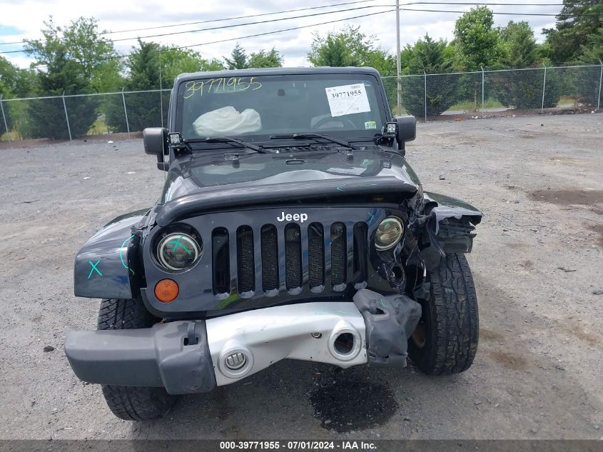 2011 Jeep Wrangler Sahara VIN: 1J4GA5D11BL617222 Lot: 39771955