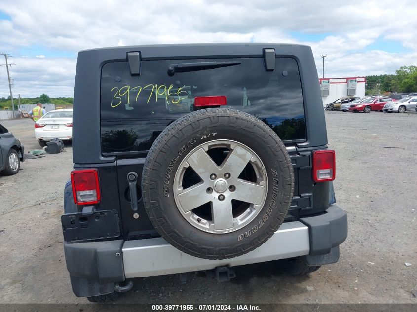 2011 Jeep Wrangler Sahara VIN: 1J4GA5D11BL617222 Lot: 39771955