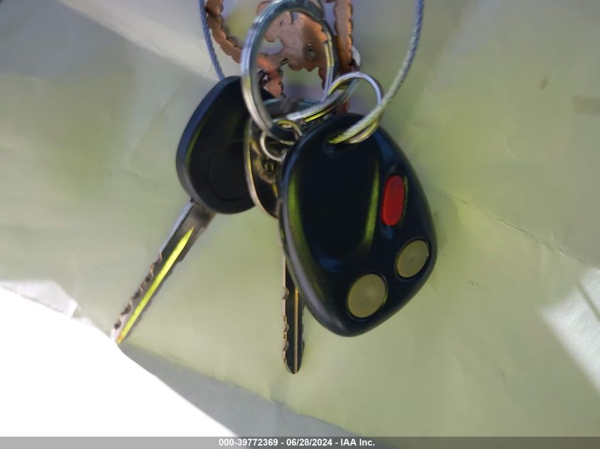 2003 Chevrolet Tahoe Lt VIN: 1GNEK13T03J104277 Lot: 39772369