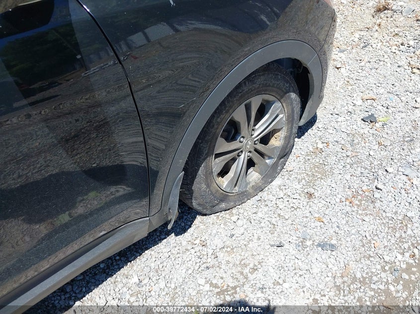 2014 Hyundai Santa Fe Sport 2.4L VIN: 5XYZUDLBXEG215161 Lot: 39772434