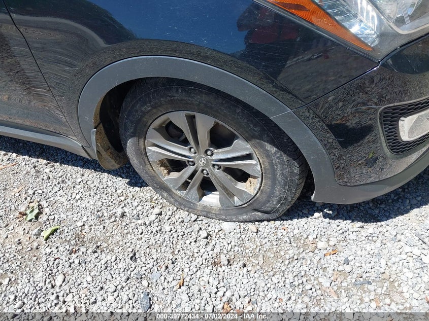 2014 Hyundai Santa Fe Sport 2.4L VIN: 5XYZUDLBXEG215161 Lot: 39772434