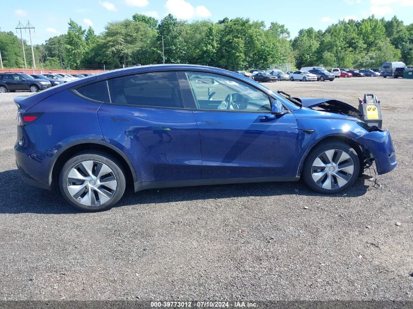 2023 Tesla Model Y Awd/Long Range Dual Motor All-Wheel Drive VIN: 7SAYGDEEXPF703419 Lot: 39773012