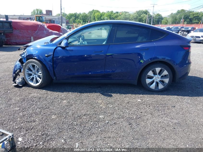 2023 Tesla Model Y Awd/Long Range Dual Motor All-Wheel Drive VIN: 7SAYGDEEXPF703419 Lot: 39773012