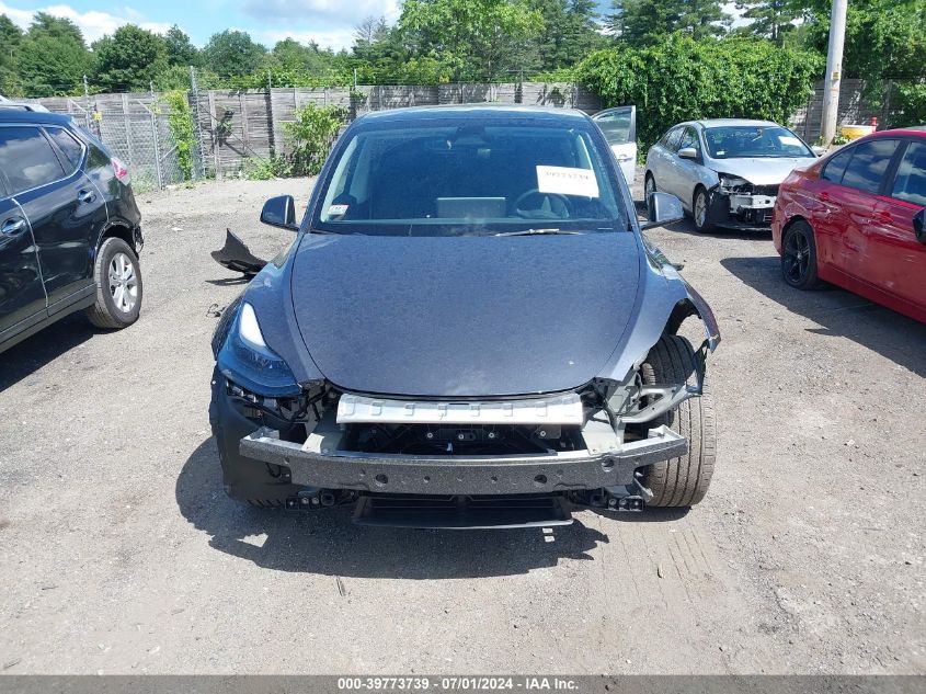 2023 Tesla Model Y Awd/Long Range Dual Motor All-Wheel Drive VIN: 7SAYGDEE5PF947754 Lot: 39773739