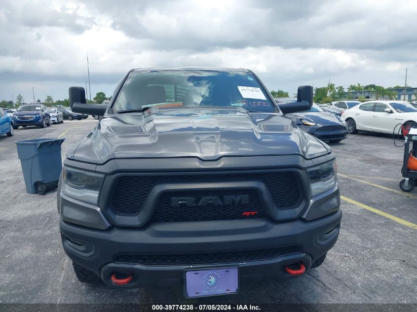 2019 Ram 1500 Rebel Quad Cab 4X4 6'4 Box VIN: 1C6SRFET3KN725156 Lot: 39774238