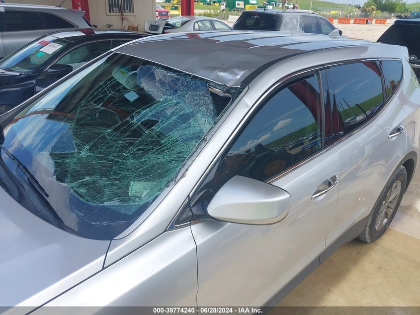 2016 Hyundai Santa Fe Sport 2.4L VIN: 5XYZTDLB1GG329104 Lot: 39774240