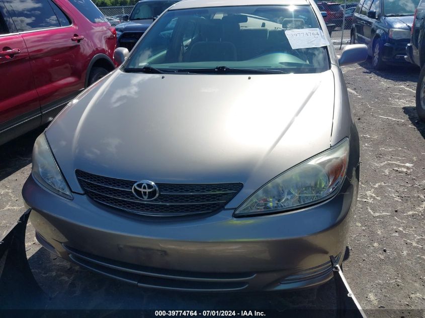2004 Toyota Camry Le VIN: 4T1BE32K74U900544 Lot: 39774764