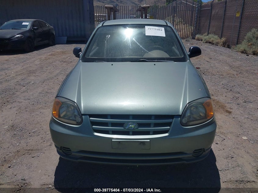2004 Hyundai Accent VIN: KMHCF35C64U291730 Lot: 39775404