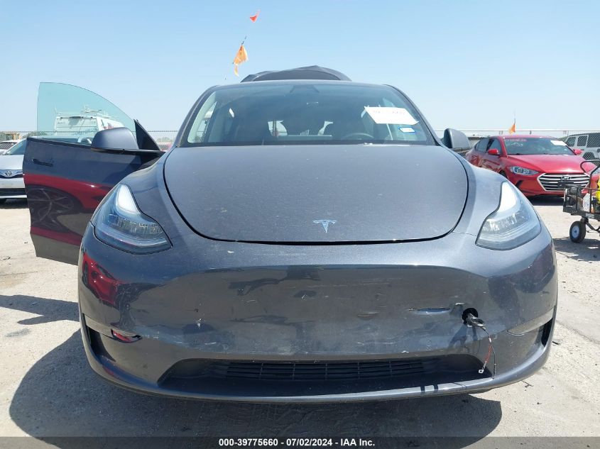 2023 Tesla Model Y Awd/Long Range Dual Motor All-Wheel Drive VIN: 7SAYGDEE3PA027702 Lot: 39775660