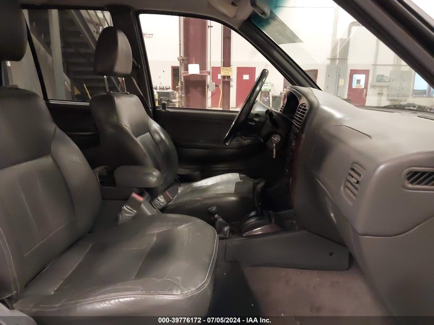 1999 Kia Sportage Ex VIN: KNDJA7238X5608511 Lot: 39776172