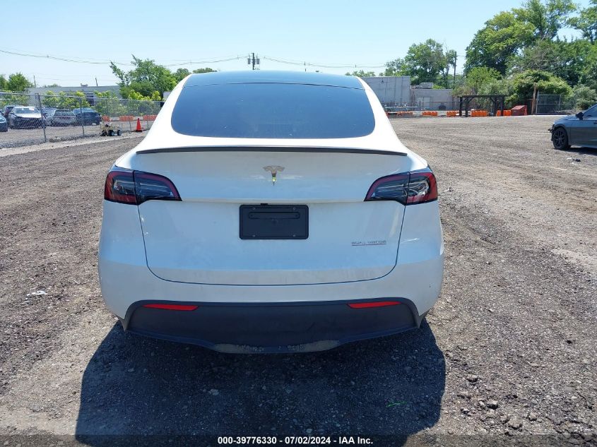 2023 Tesla Model Y VIN: 7SAYGDEF0PF807653 Lot: 39776330