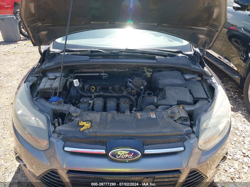 2014 Ford Focus Titanium VIN: 1FADP3N25EL410233 Lot: 39777290